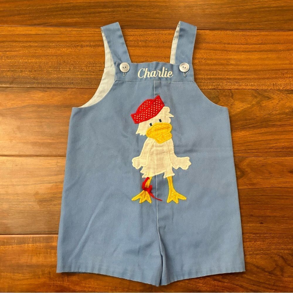 The Frog Pond Vintage Blue Embroidered Duck Overall Romper Name Charlie
